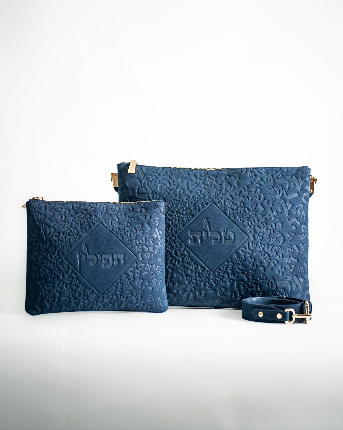 Blue leather Israel Letters tallit bag and tefillin bag set on white