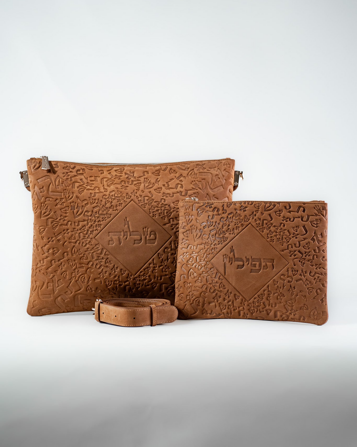 Light brown leather Israel Letters tallit bag and tefillin bag set on white