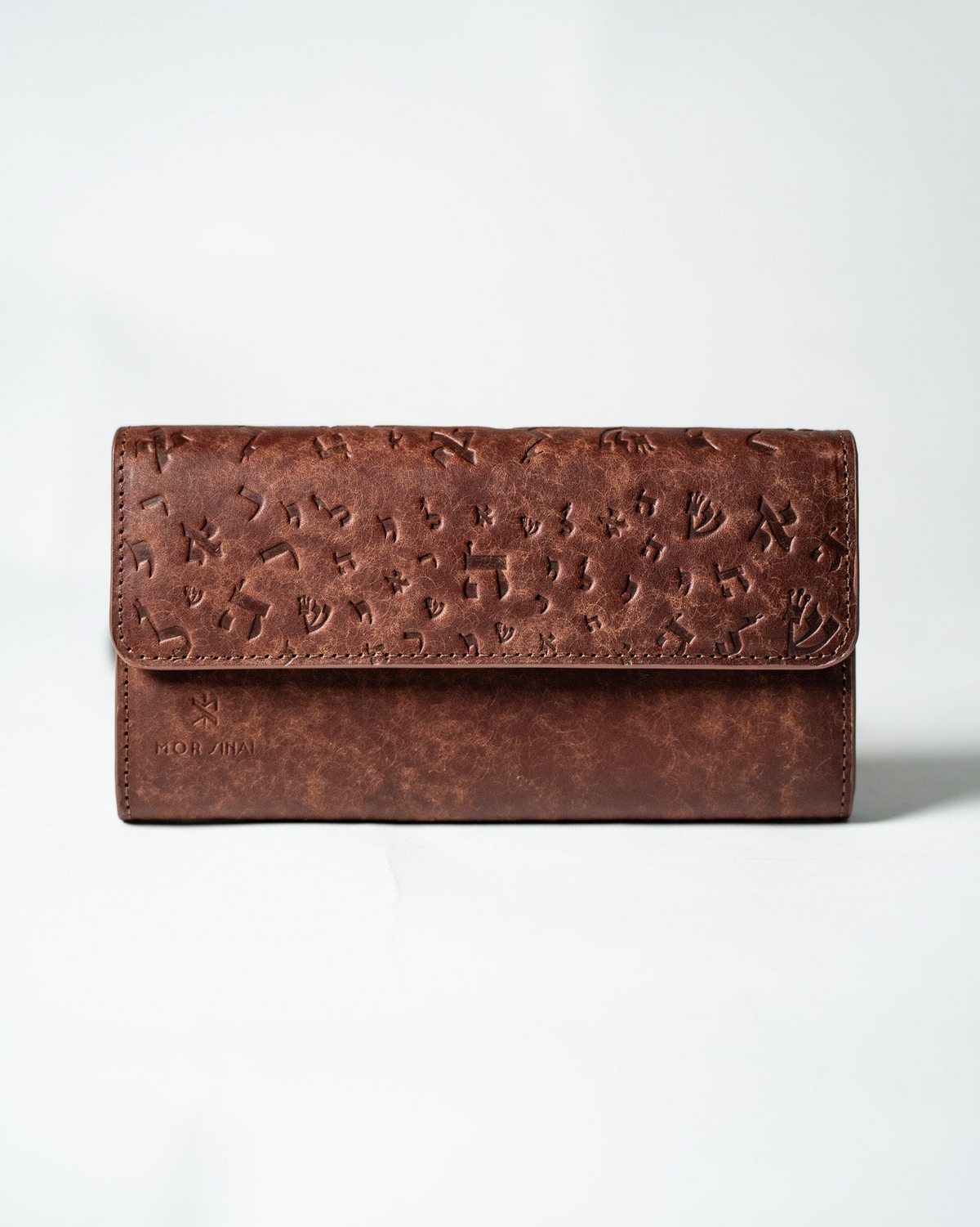 Brown leather ladies wallet with embossed Israel Letters, front view